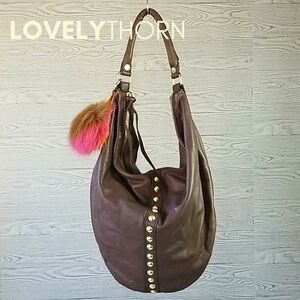 LINEA PELLE // ltd ed brown genuine distressed leather stud hobo bag